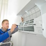 JW Plumbing, Heating and Air installing a Ductless mini-split in Los Angeles, CA