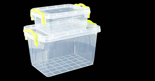 Image: transparent tote bins used for storage.