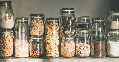 Image: decanted food in mason jars.