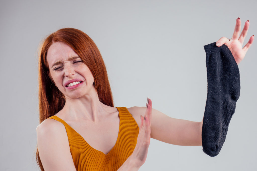 woman with a dirty sock 